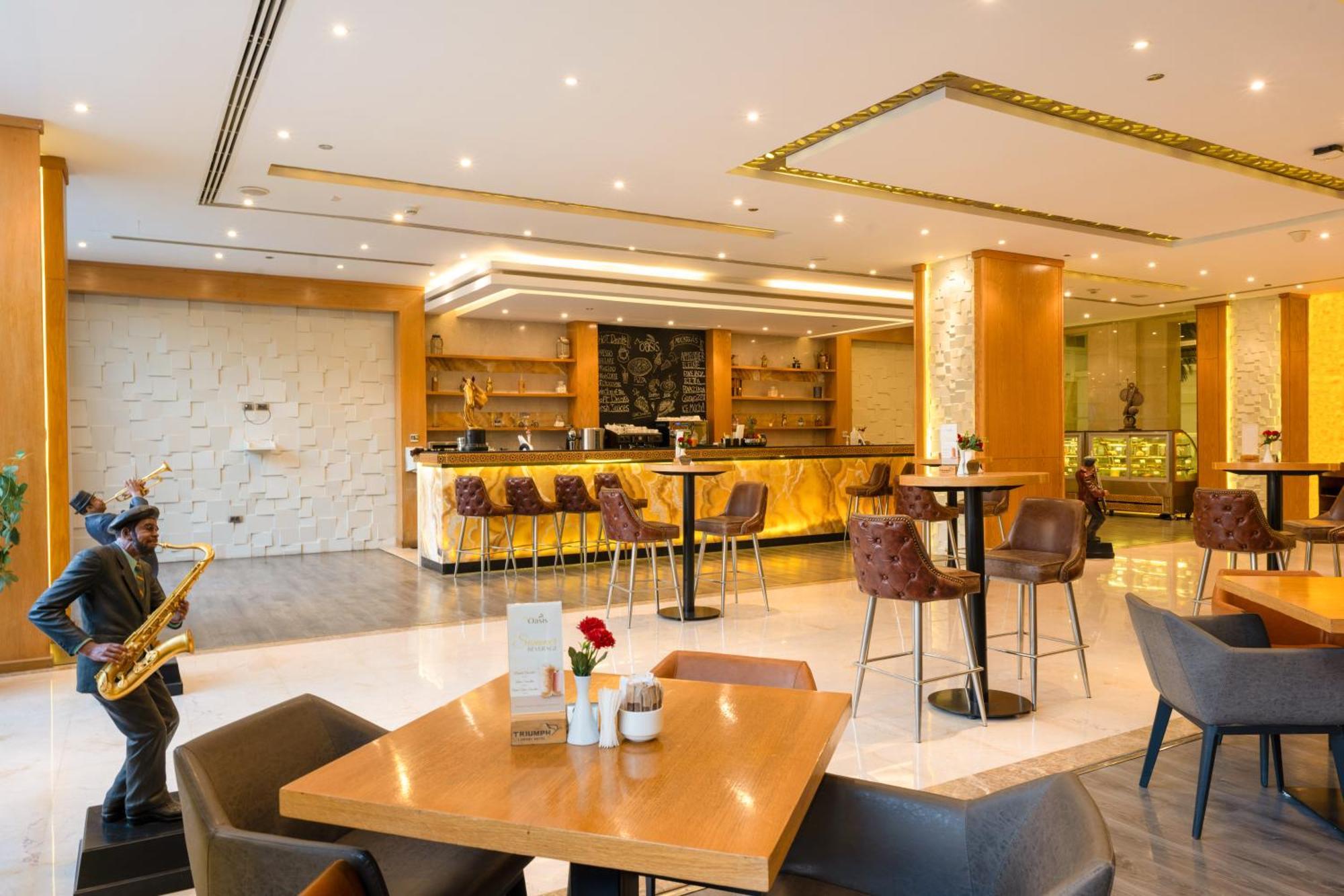 Triumph Luxury Hotel Kahire Dış mekan fotoğraf The lounge at the airport