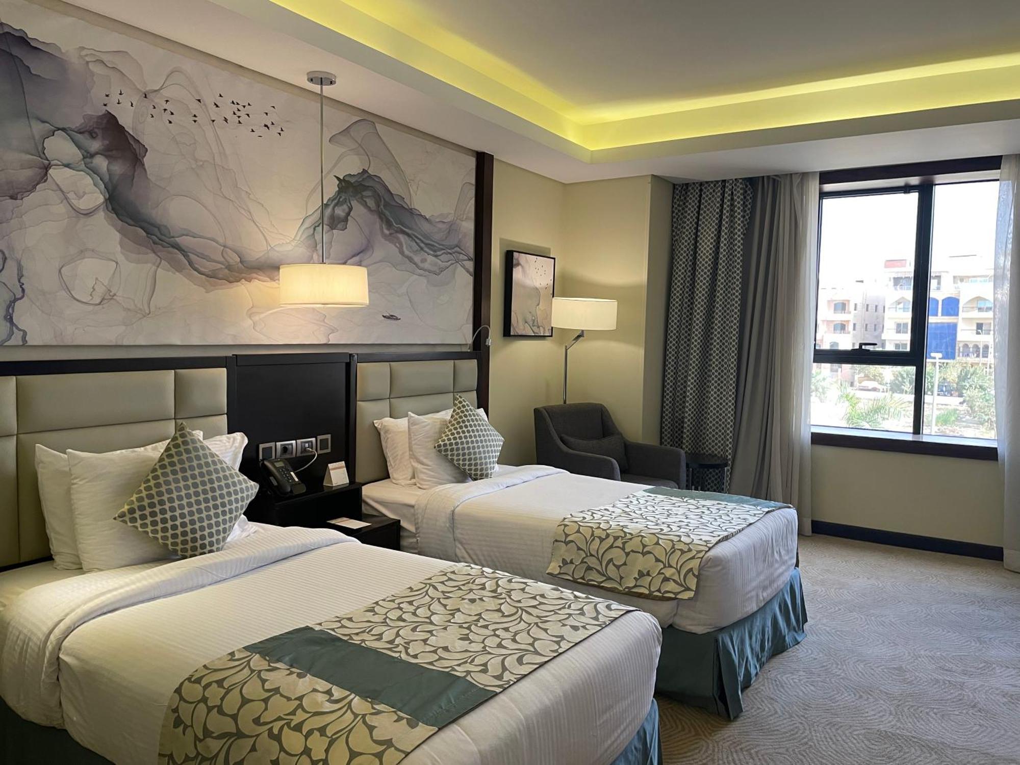 Triumph Luxury Hotel Kahire Dış mekan fotoğraf A room at the hotel